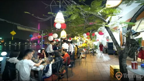 a group of people sitting at tables