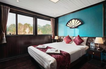 a bedroom with a large window