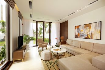 a living room with a large glass door
